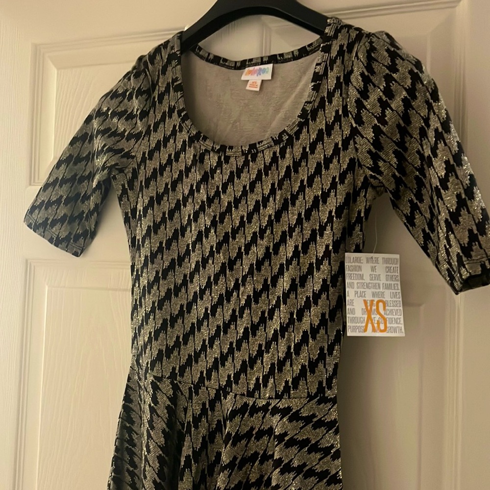 Vintage LuLaRose Nicole. Circa 2017. Brand new with tags never worn.  Fits TTS.